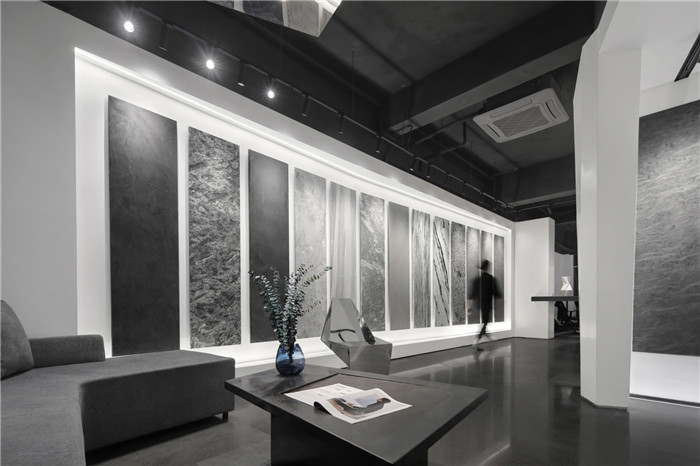 黑白灰構造極簡藝術風駿美石材展廳展示區(qū)裝修設計方案